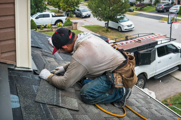 Professional Roofing technician working in Campbell, OH